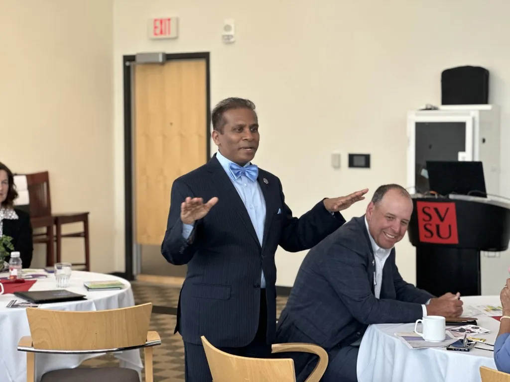 Dr. Debasish Mridha, MD speaking at the Mridha International Peace Symposium at Saginaw Valley State University